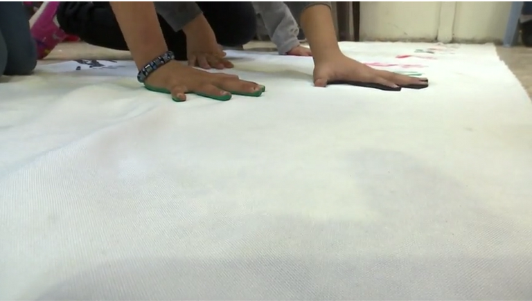 "ستعود فلسطين" كلمات ملوّنة بأنامل أطفال الأردن