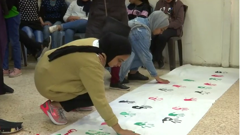 "ستعود فلسطين" كلمات ملوّنة بأنامل أطفال الأردن