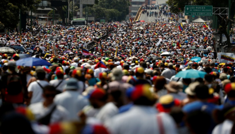 مسيرة في كاراكاس ضد الرئيس الفنزويلي نيكولاس مادورو - رويترز