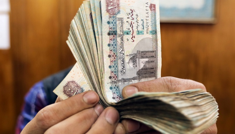 تحسن قيمة الجنيه المصري أمام الدولار