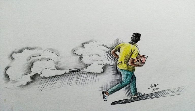 أحد متظاهري السودان يتصدى لقنابل الغاز المدمع