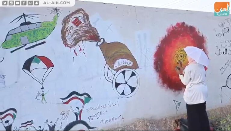 لوحات جرافيتي عملاقة في ساحة الاعتصام بالخرطوم