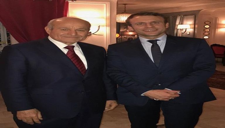 الرئيس الفرنسي ورجل الأعمال الجزائري يسعد ربراب - أرشيفية