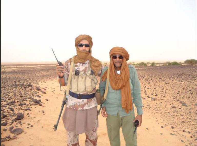 تميم يصافح مصطفى الشافعي سفير الإرهاب القطري بأفريقيا