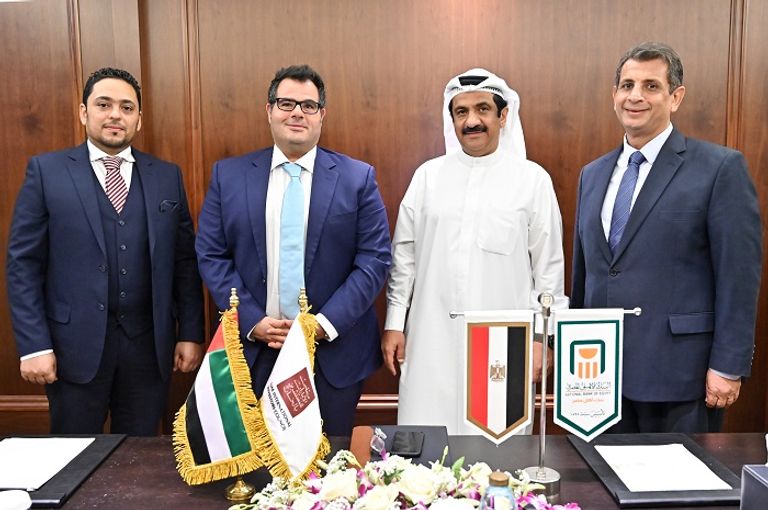 الجروان خلال لقائه قيادات البنك الأهلي المصري