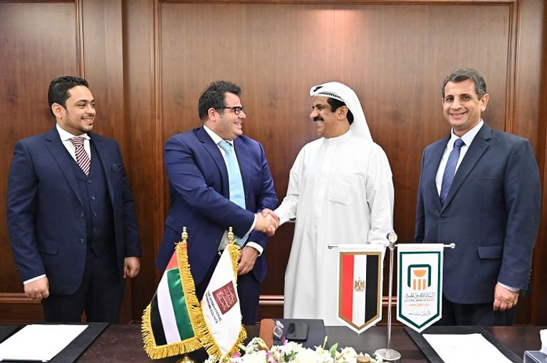 الجروان خلال لقائه قيادات البنك الأهلي المصري