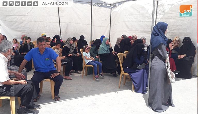 ملصق مشروع السوق الخيري في غزة