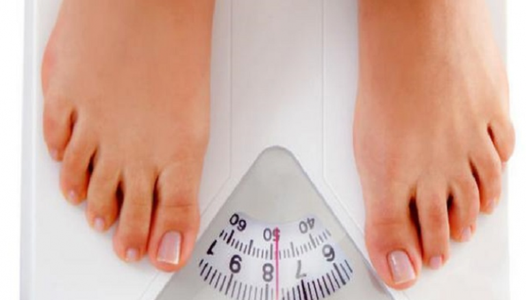 دراسة تنصح بقياس الوزن يوميا للحفاظ على الرشاقة - صورة أرشيفية
