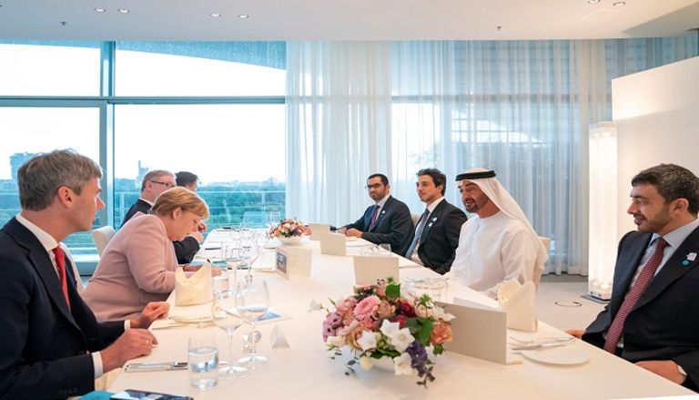الشيخ محمد بن زايد آل نهيان خلال كلمة مشتركة مع المستشارة الألمانية