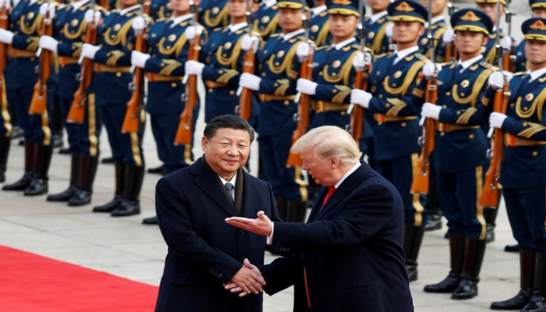 الرئيس الأمريكي ونظيره الصيني في لقاء سابق ببكين- رويترز