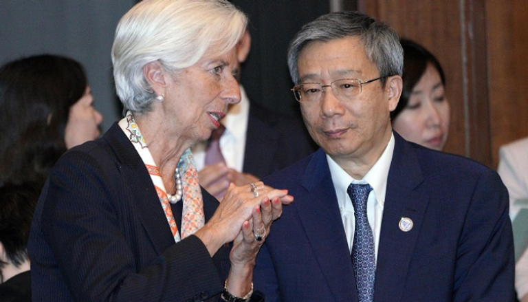 كريستين لاجارد وحاكم البنك المركزي الصيني - رويترز