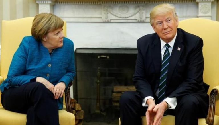المستشارة الألمانية أنجيلا ميركل والرئيس الأمريكي دونالد ترامب-أرشيفية