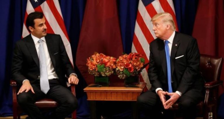 الرئيس الأمريكي وأمير قطر في لقاء سابق