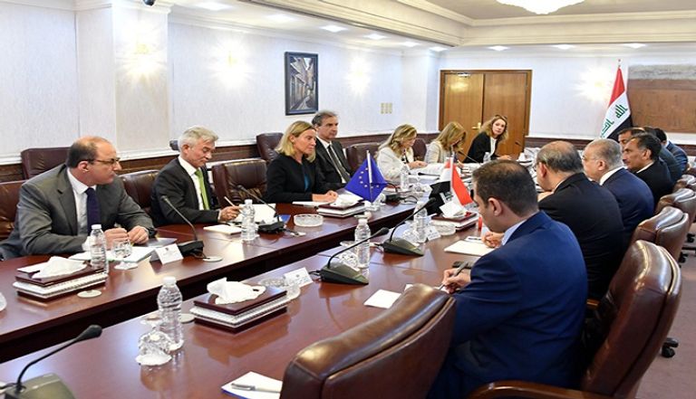 وزير الخارجية العراقي محمد علي الحكيم وفيدريكا موجريني