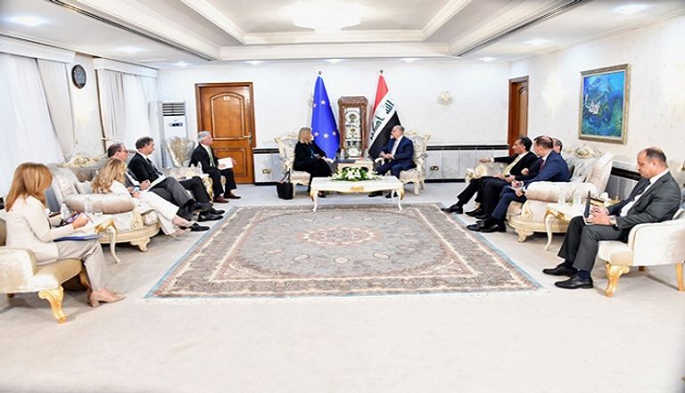 وزير الخارجية العراقي محمد علي الحكيم وفيدريكا موجريني