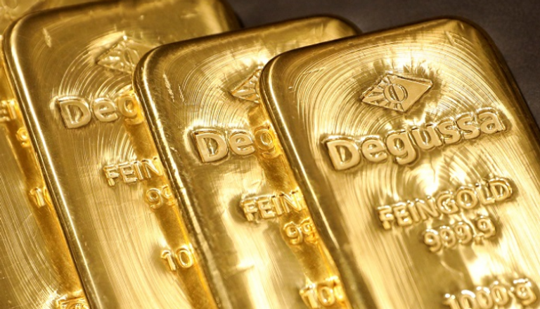 ارتفاع الذهب وصعود الدولار يحد من المكاسب