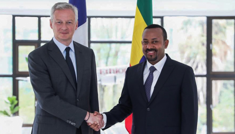 رئيس الوزراء الإثيوبي آبي أحمد خلال استقبال الوزير الفرنسي