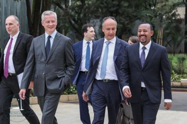 رئيس الوزراء الإثيوبي آبي أحمد خلال استقبال الوزير الفرنسي