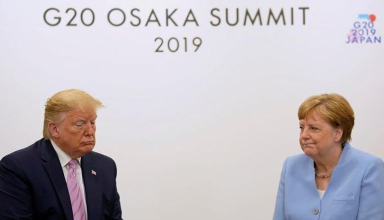 ترامب وميركل في لقاء سابق بقمة العشرين باليابان