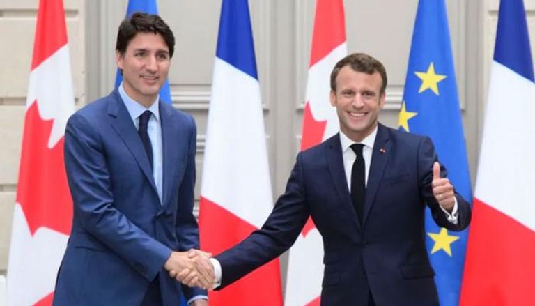 الرئيس الفرنسي إيمانويل ماكرون ورئيس وزراء كندا جاستن ترودو