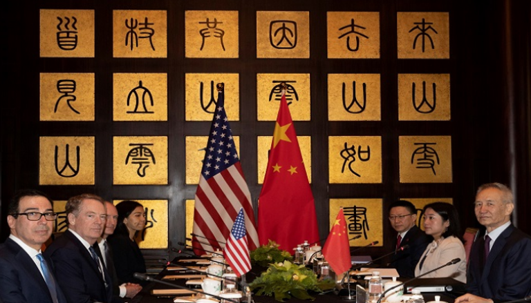 جانب من محادثات التجارة بين واشنطن وبكين في شنغهاي - رويترز