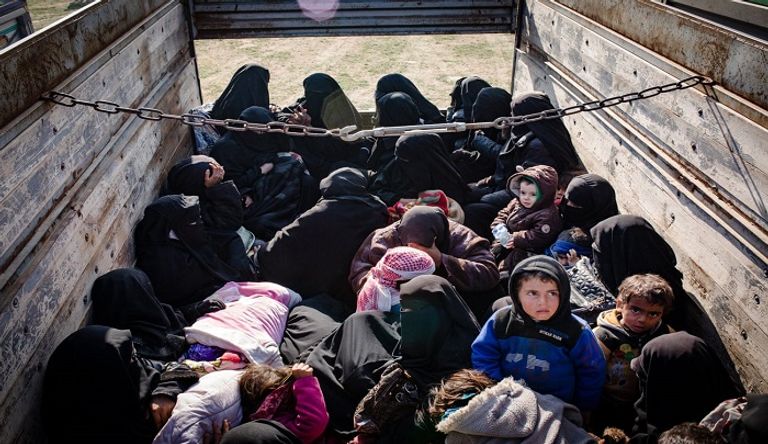 صورة أرشيفية لنازحين من الإيزيديين في العراق (رويترز)