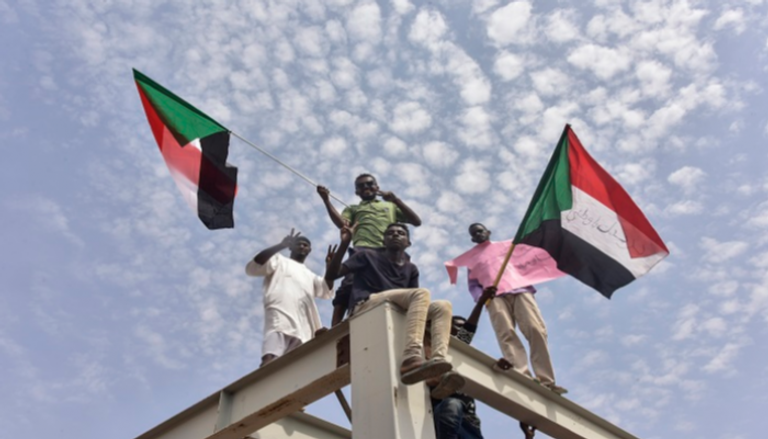 فرحة الشعب السوداني بتوقيع الاتفاق - رويترز