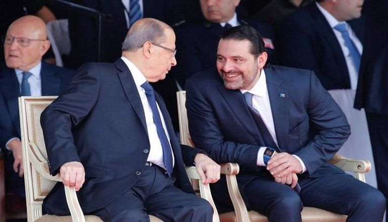 حوار بين الرئيس اللبناني ميشال عون ورئيس الوزراء سعد الحريري - رويترز
