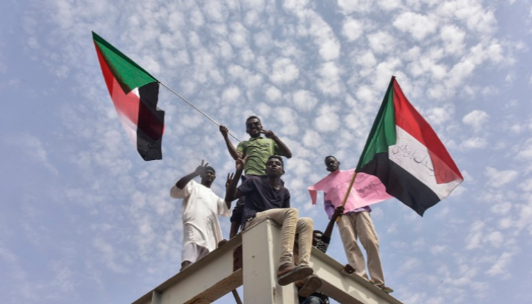 سودانيون يحتفلون بالاتفاق السياسي في بلدهم