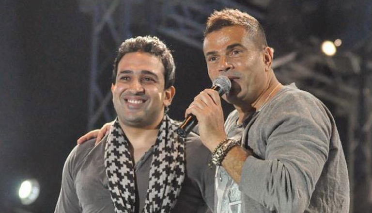 الفنان عمرو دياب مع الشاعر تامر حسين 