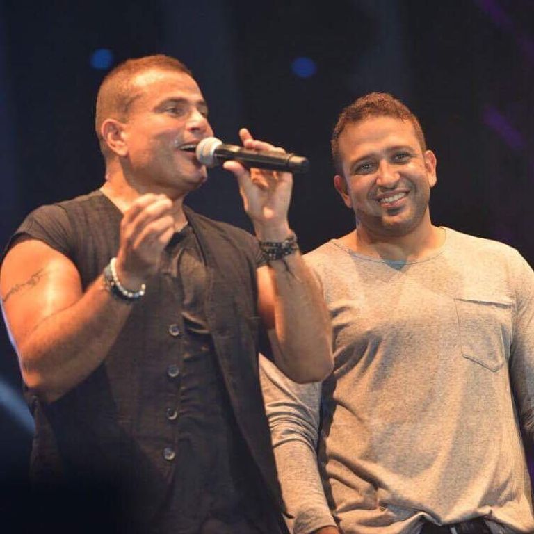 الفنان عمرو دياب مع الشاعر تامر حسين