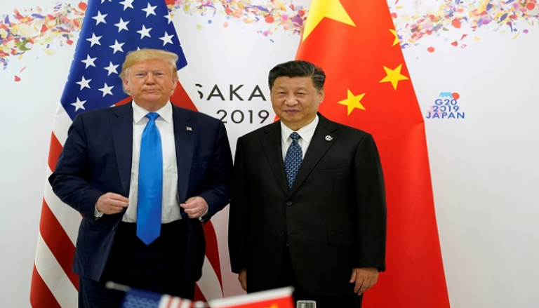 الرئيس الأمريكي ونظيره الصيني في لقاء سابق - رويترز
