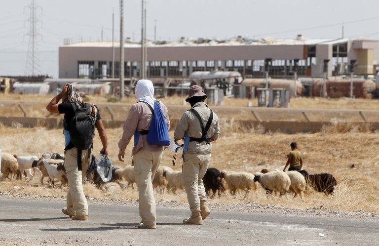 الألغام تحول مزارع بيجي العراقية إلى حقول موت