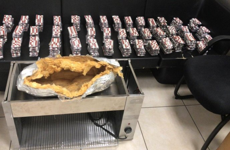 السلطات الأردنية تحبط محاولة تهريب المخدرات في علب حلويات