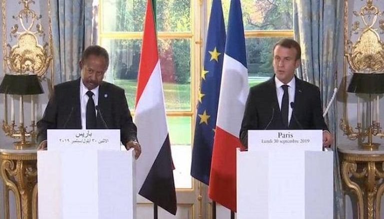 المؤتمر الصحفي المشترك بين الرئيس الفرنسي ورئيس وزراء السودان