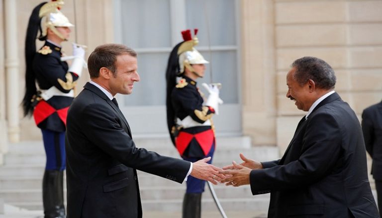 المؤتمر الصحفي المشترك بين الرئيس الفرنسي ورئيس وزراء السودان