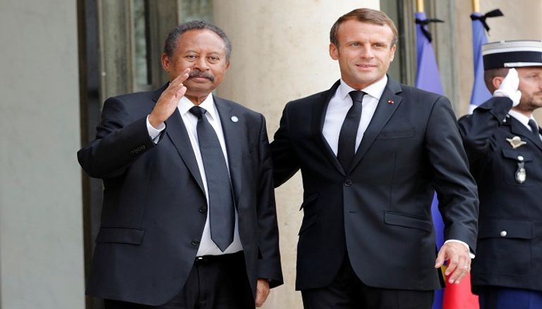 المؤتمر الصحفي المشترك بين الرئيس الفرنسي ورئيس وزراء السودان