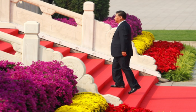 الرئيس الصيني خلال زيارة النصب التذكاري لأبطال الشعب - رويترز