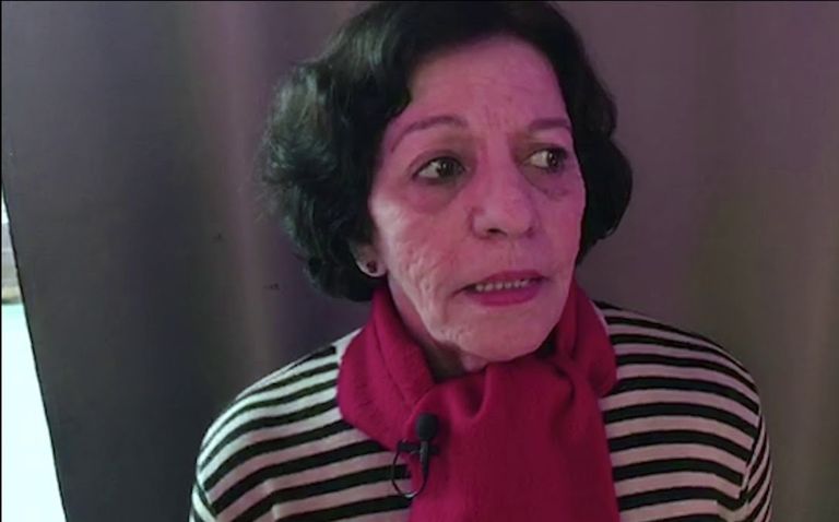 الفنانة والمخرجة الفلسطينية خديجة حباشنة ملصق أسبوع الفيلم الفلسطيني بالقاهرة