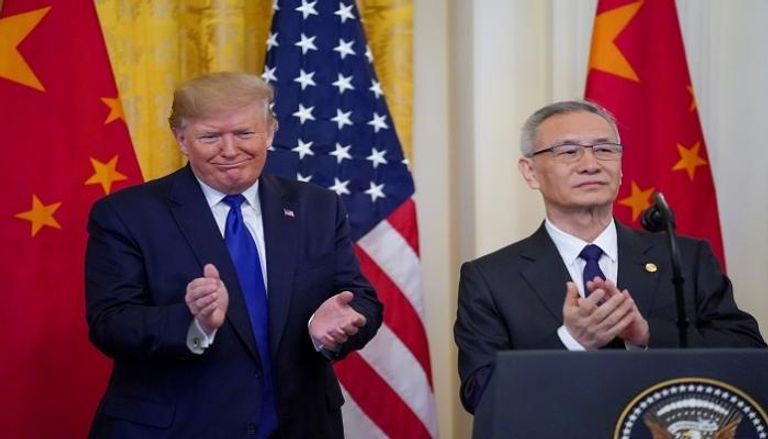 جانب من توقيع اتفاق التجارة بين واشنطن وبكين
