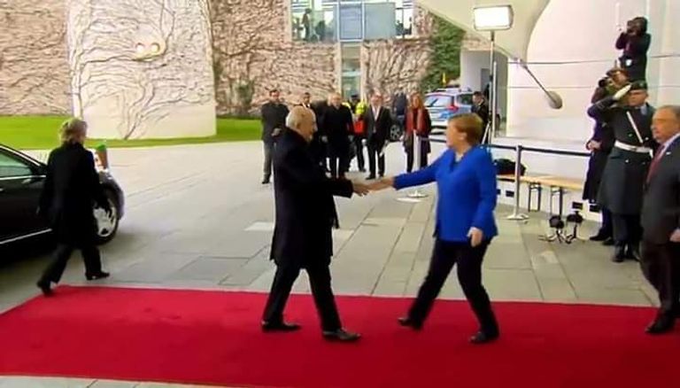 الرئيس الجزائري والمستشارة الألمانية في مؤتمر برلين استقبال المستشارة الألمانية للرئيس الجزائري في مؤتمر برلين