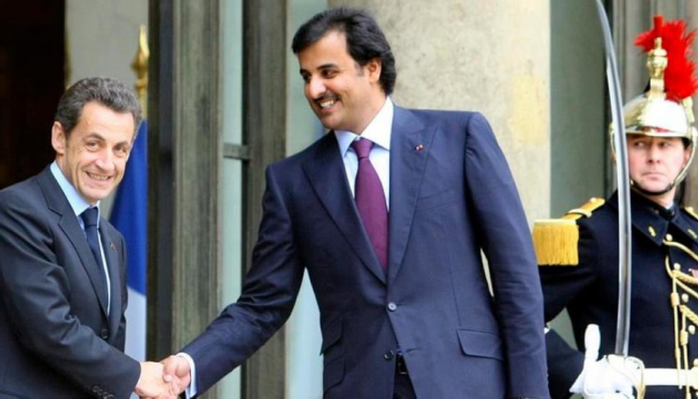 أمير قطر تميم بن حمد والرئيس الفرنسي الأسبق نيكولا ساركوزي - أرشيفية