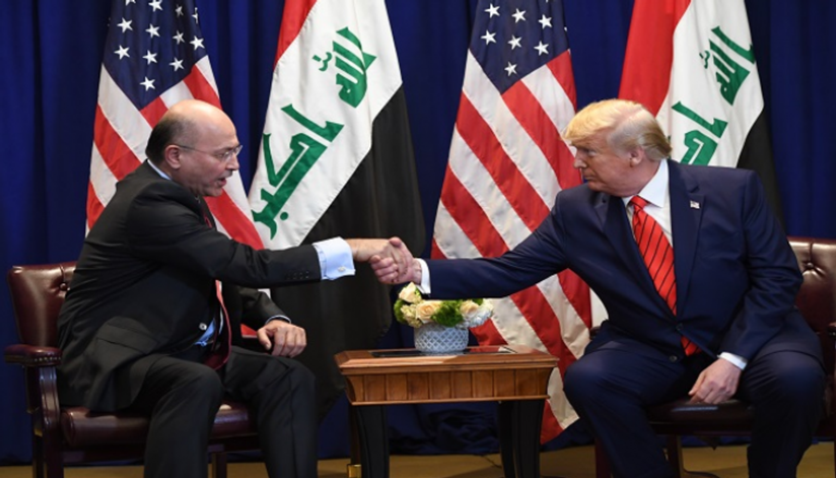 الرئيس الأمريكي دونالد ترامب ونظيره العراقي برهم صالح - أ.ف.ب
