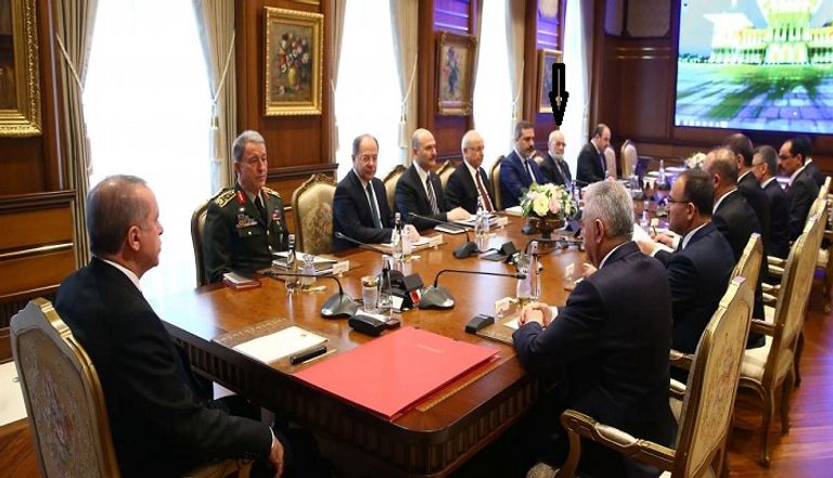 أردوغان وبجواره عدنان تانفيردي مؤسس الشركة الأمنية المثيرة للجدل