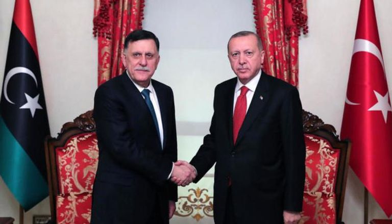 الرئيس التركي رجب طيب أردوغان وفايز السراج