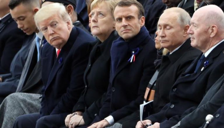 بوتين وماكرون وترامب خلال احتفالات قوس النصر بباريس 
