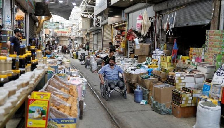 سوق تجاري عراقي - رويترز