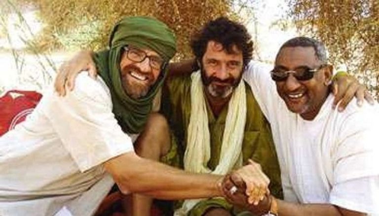 المصطفى الإمام الشافعي يمين الصورة ولد الإمام الشافعي يتقدم مستقبلي أمير قطر في رواندا - أرشيفية