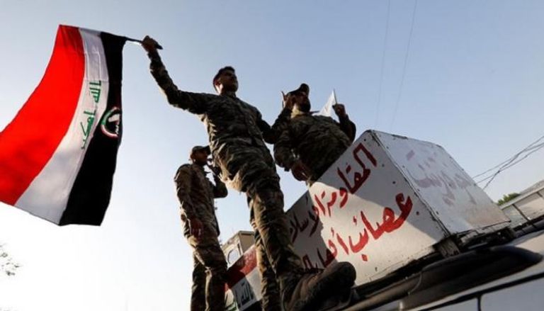 عناصر تابعة لمليشيا الحشد الشعبي الموالية لإيران