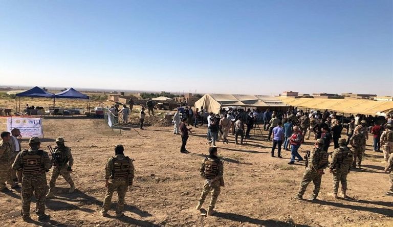 نساء إيزيديات يشهدن فتح مقبرة لضحايا داعش